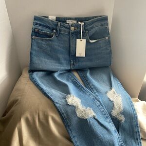 Good American Light Blue Skinny Jeans with Knee Distressing